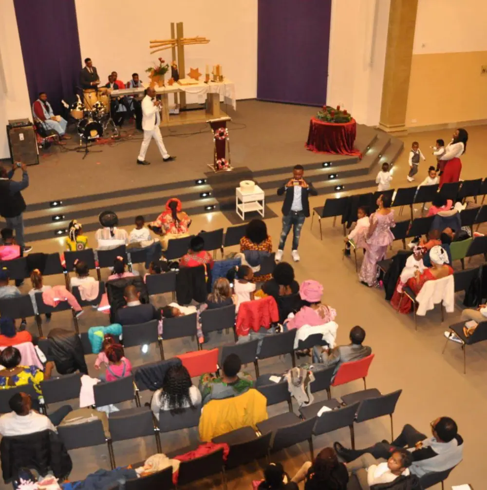 Congregation gathered in worship at Destined Winners Ministry, showcasing a vibrant and Spirit-filled church service with music, prayer, and community fellowship.